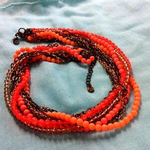 24-2 Loft beautiful peach and orange with chains and crystals too.